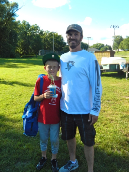 Vince, a baseball trophy and Jason